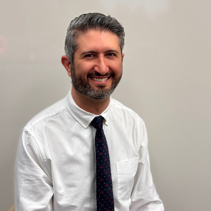 Oklahoma City orthodontist Doctor Payam Ishani Afousi wearing a plaid bow tie