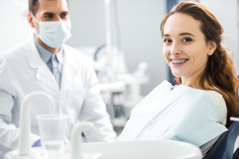 Patient smiling after getting braces