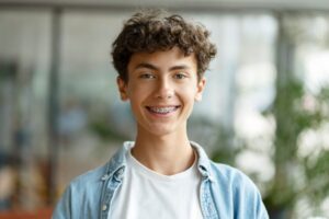 Kid with braces.